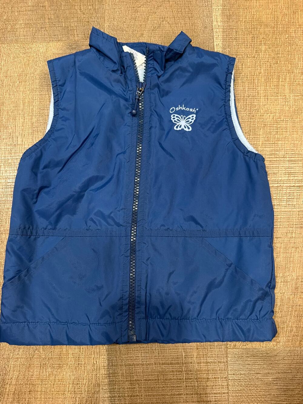 Vintage navy blue kids' windbreaker vest from OshKosh B'gosh